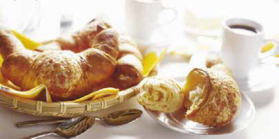 Pastries arranged on platters.